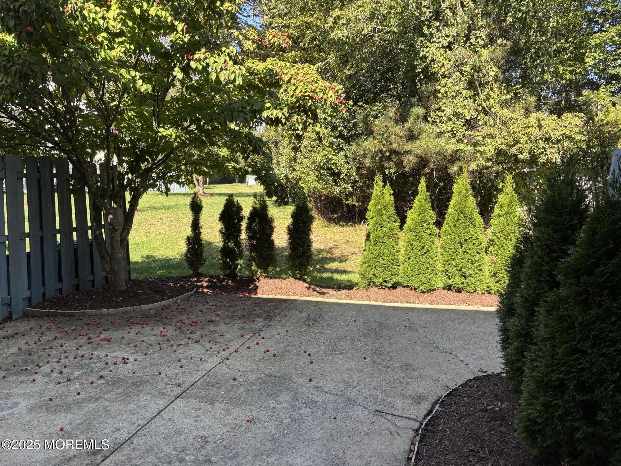 276 Sugar Maple Court Howell, NJ 07731 - Photo 31 of 34 a view of a road with a yard
