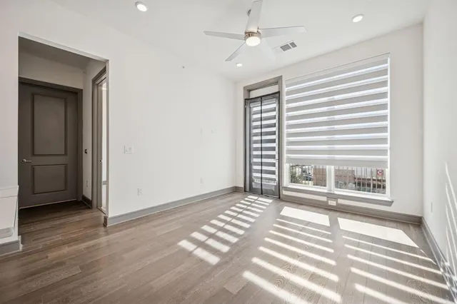 an empty room with windows