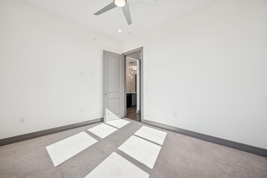 2700 Old Denton Road, Unit 4451 Carrollton, TX 75007 - Photo 17 of 38 an empty room with an entryway