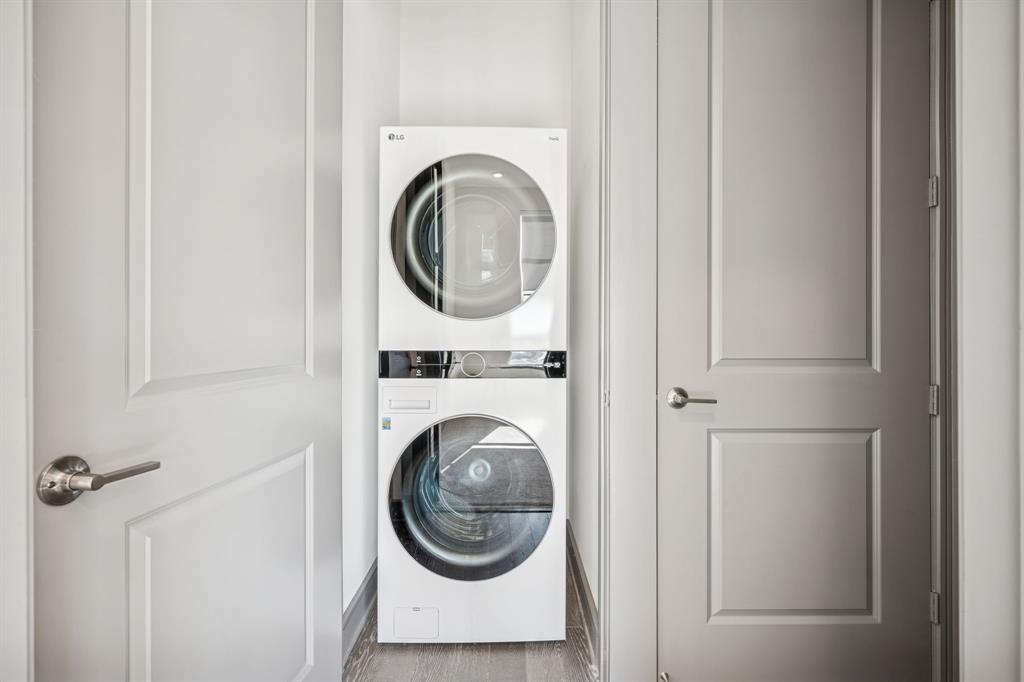 2700 Old Denton Road, Unit 4451 Carrollton, TX 75007 - Photo 23 of 38 a view of a hallway with washer and dryer