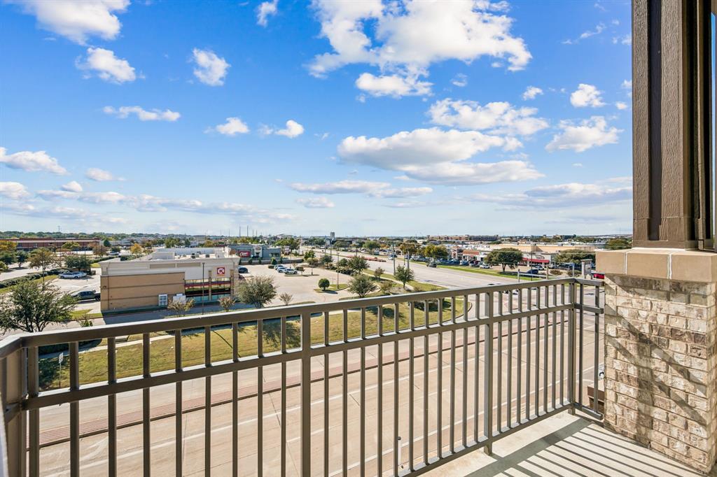 2700 Old Denton Road, Unit 4451 Carrollton, TX 75007 - Photo 25 of 38 a view of a city from a balcony