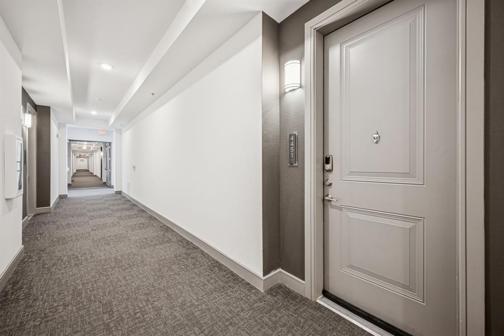 2700 Old Denton Road, Unit 4451 Carrollton, TX 75007 - Photo 5 of 38 a view of hallway with livingroom