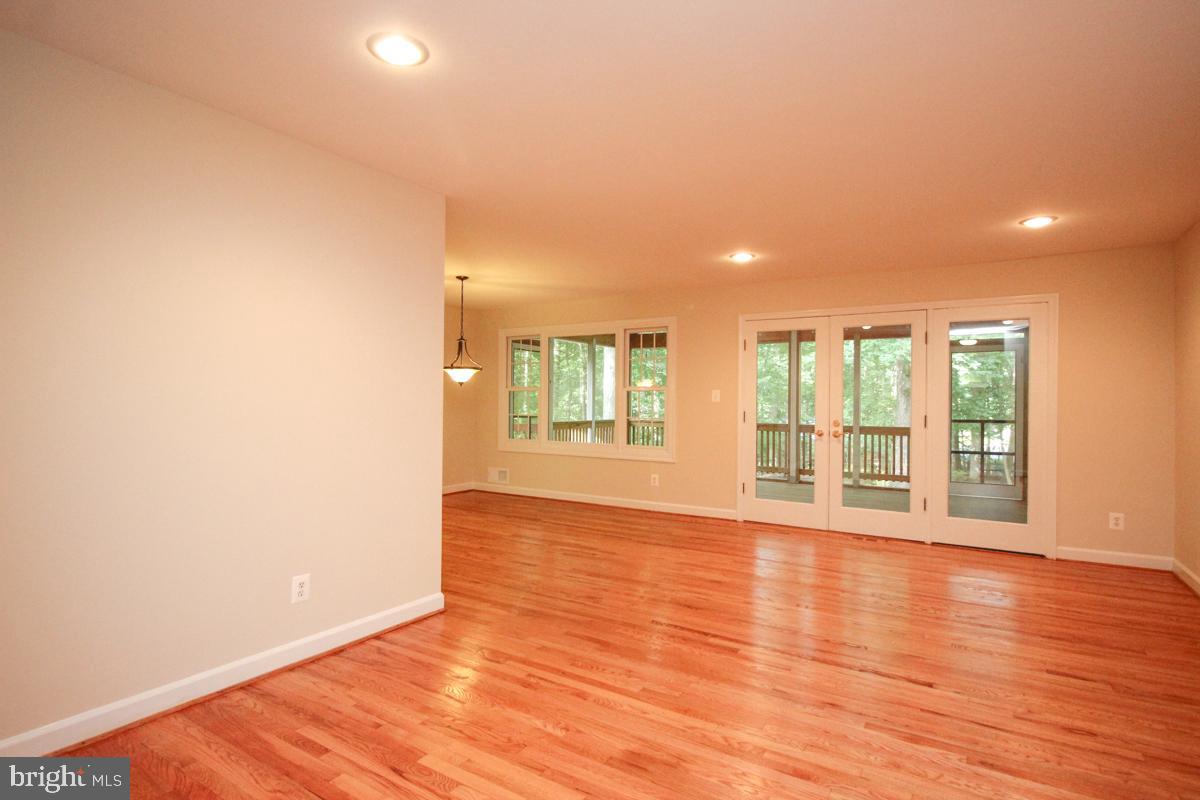 2400 Paddock Lane Reston, VA 20191 - Photo 14 of 47 Nicely finished hardwood floors on top two levels