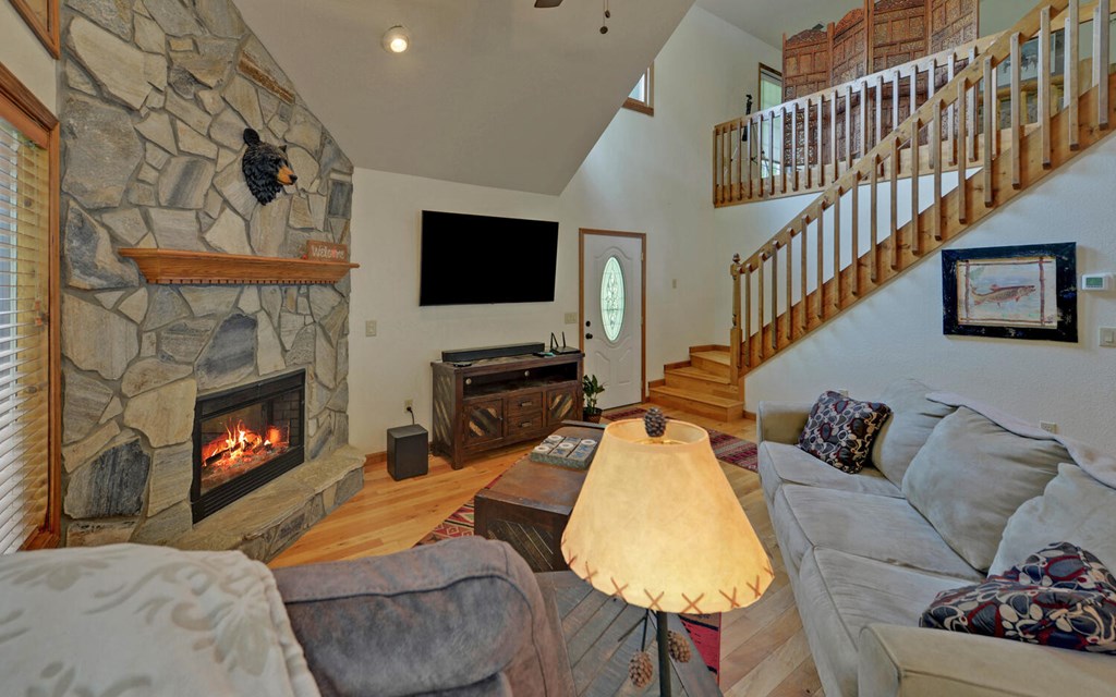 56 Waxwing Trail Murphy, NC 28906 - Photo 14 of 49 a living room with furniture and a fireplace