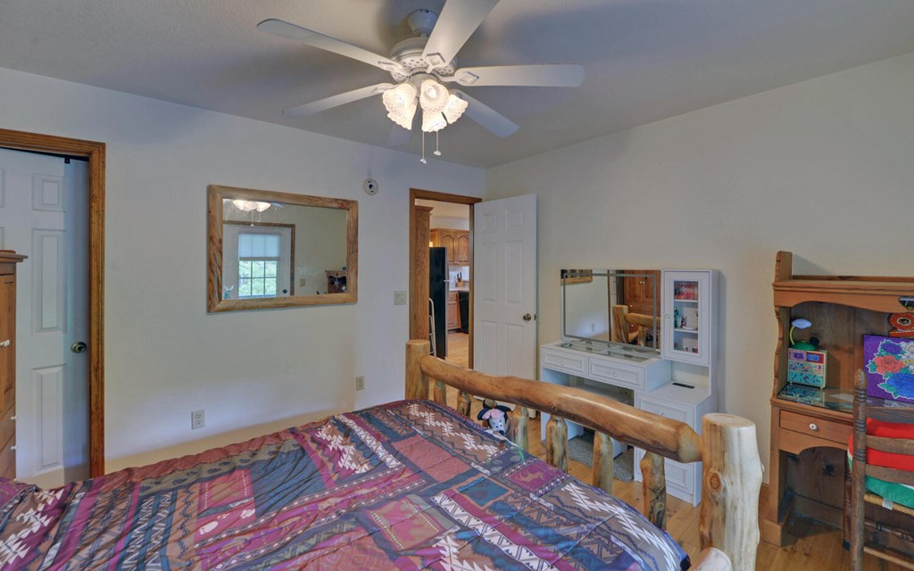 56 Waxwing Trail Murphy, NC 28906 - Photo 16 of 49 workspace with wooden floor windows and closet