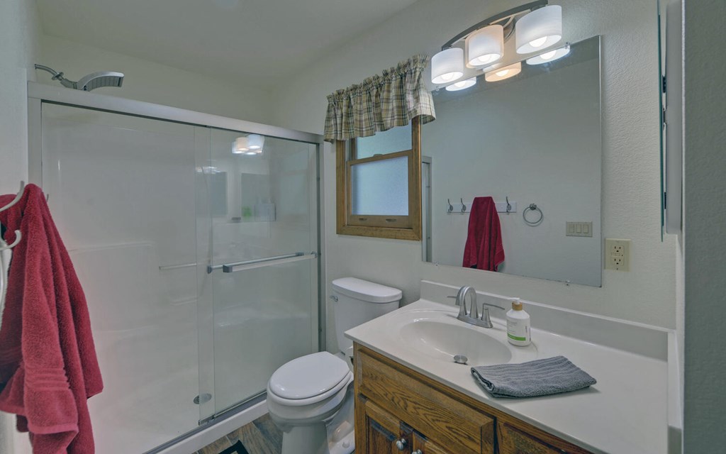 56 Waxwing Trail Murphy, NC 28906 - Photo 19 of 49 a bathroom with a sink vanity granite and toilet