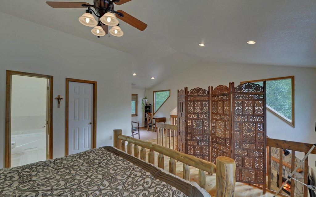 56 Waxwing Trail Murphy, NC 28906 - Photo 25 of 49 a view of a hallway with a chandelier