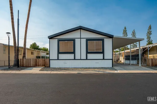 a view of a house with a street