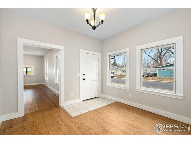 a view of an empty room and window