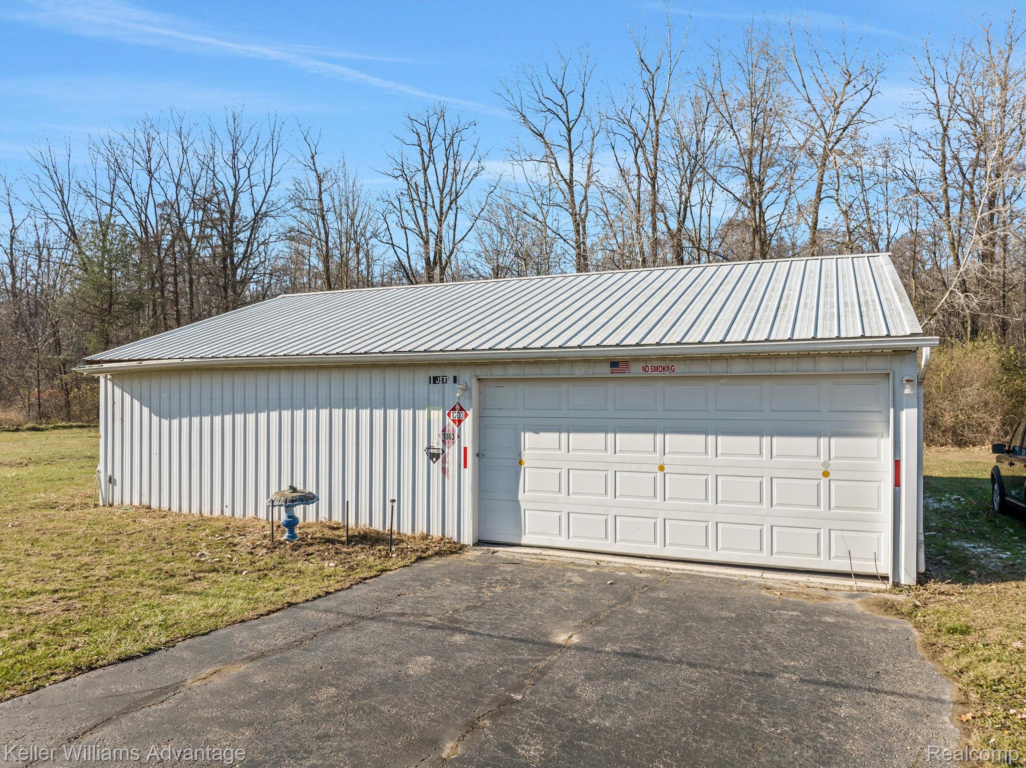 12242 Bunton Road Willis, MI 48191 - Photo 22 of 27 Pole Barn with 2-door garage style entrance