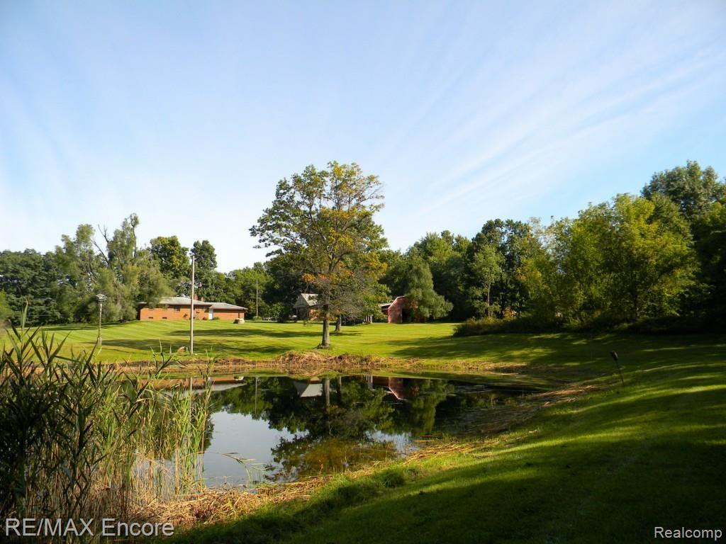 9475 Oakhill Road Holly, MI 48442 - Photo 2 of 32 Beautiful acreage with Pond & Woods