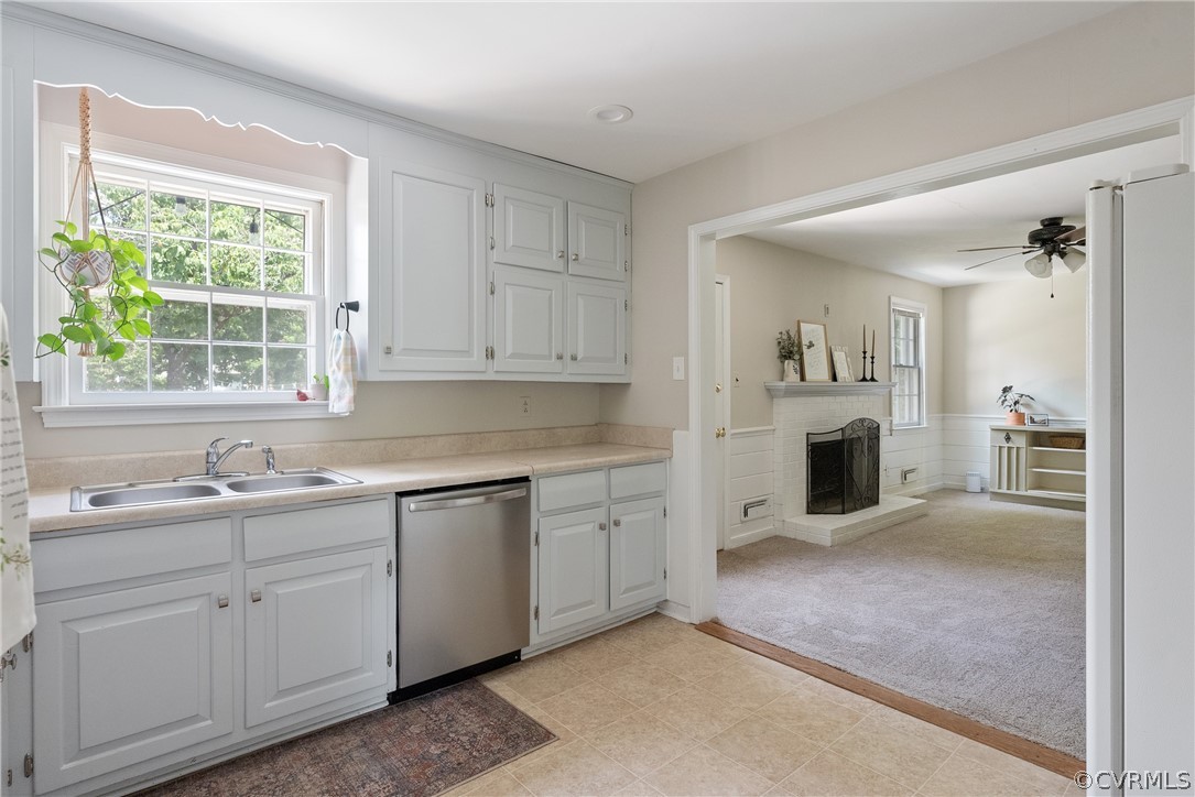 3121 Yukon Road Richmond, VA 23235 - Photo 11 of 27 a kitchen with white cabinets and sink