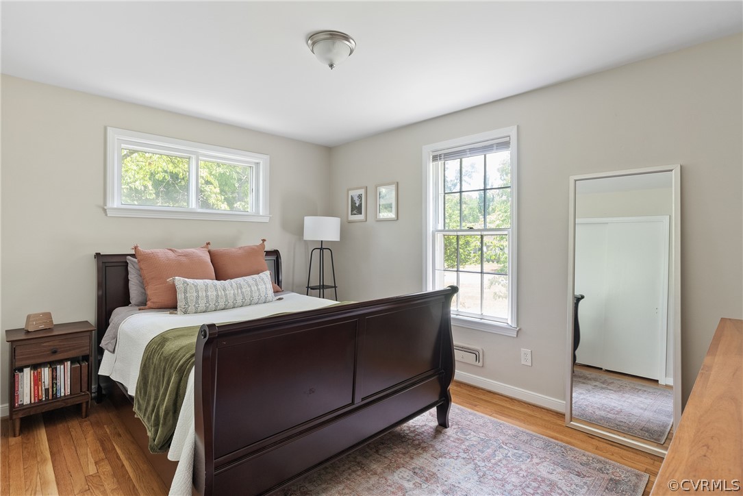 3121 Yukon Road Richmond, VA 23235 - Photo 16 of 27 a bedroom with a bed and a window