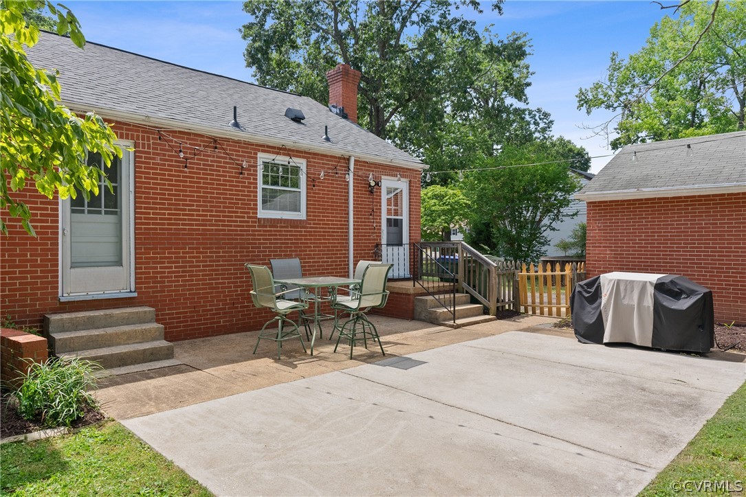 3121 Yukon Road Richmond, VA 23235 - Photo 21 of 27 a view of backyard with outdoor seating and trees
