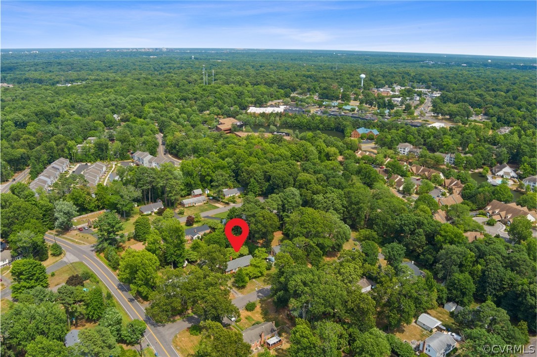 3121 Yukon Road Richmond, VA 23235 - Photo 26 of 27 a view of a green field with lots of bushes
