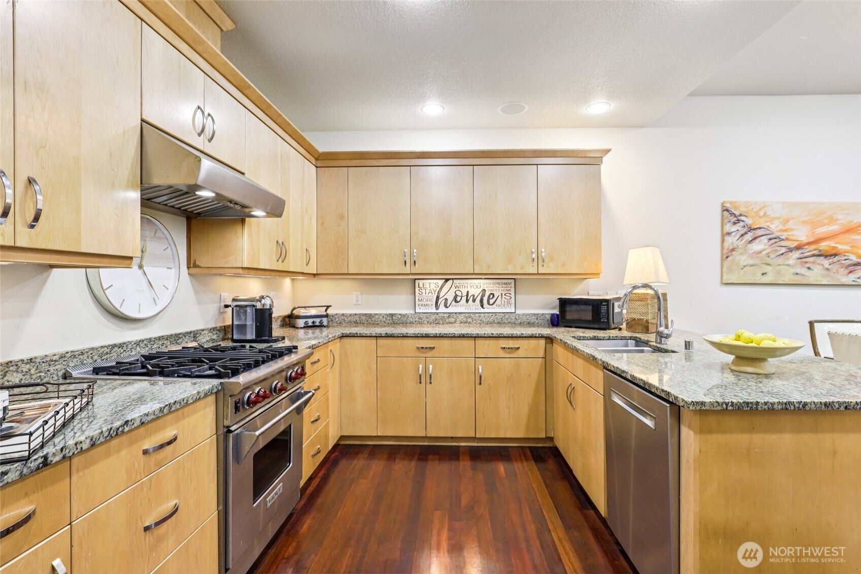 7812 Northwest Quinault Street, Unit 5 Camas, WA 98607 - Photo 11 of 40 a kitchen with a sink a stove and cabinets