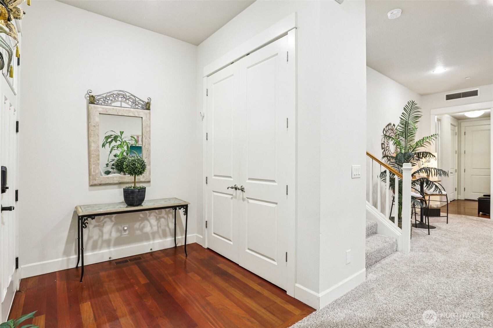 7812 Northwest Quinault Street, Unit 5 Camas, WA 98607 - Photo 17 of 40 a view of a hallway with entryway wooden floor and windows