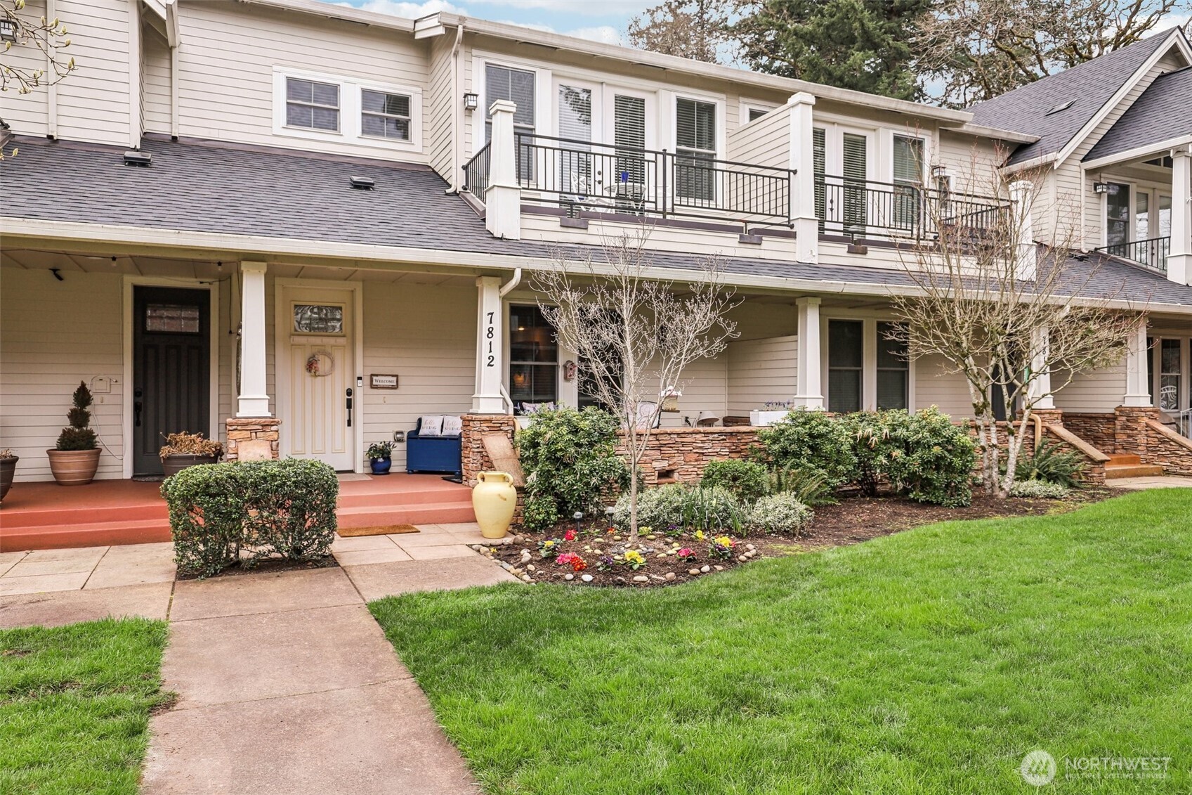 7812 Northwest Quinault Street, Unit 5 Camas, WA 98607 - Photo 2 of 40 a front view of a house with garden