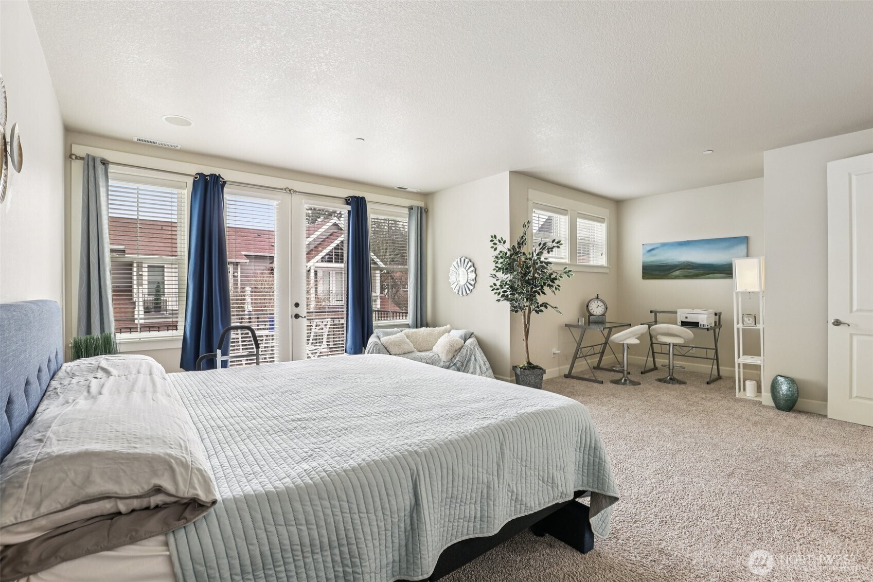 7812 Northwest Quinault Street, Unit 5 Camas, WA 98607 - Photo 22 of 40 a bedroom with a bed couch and a window