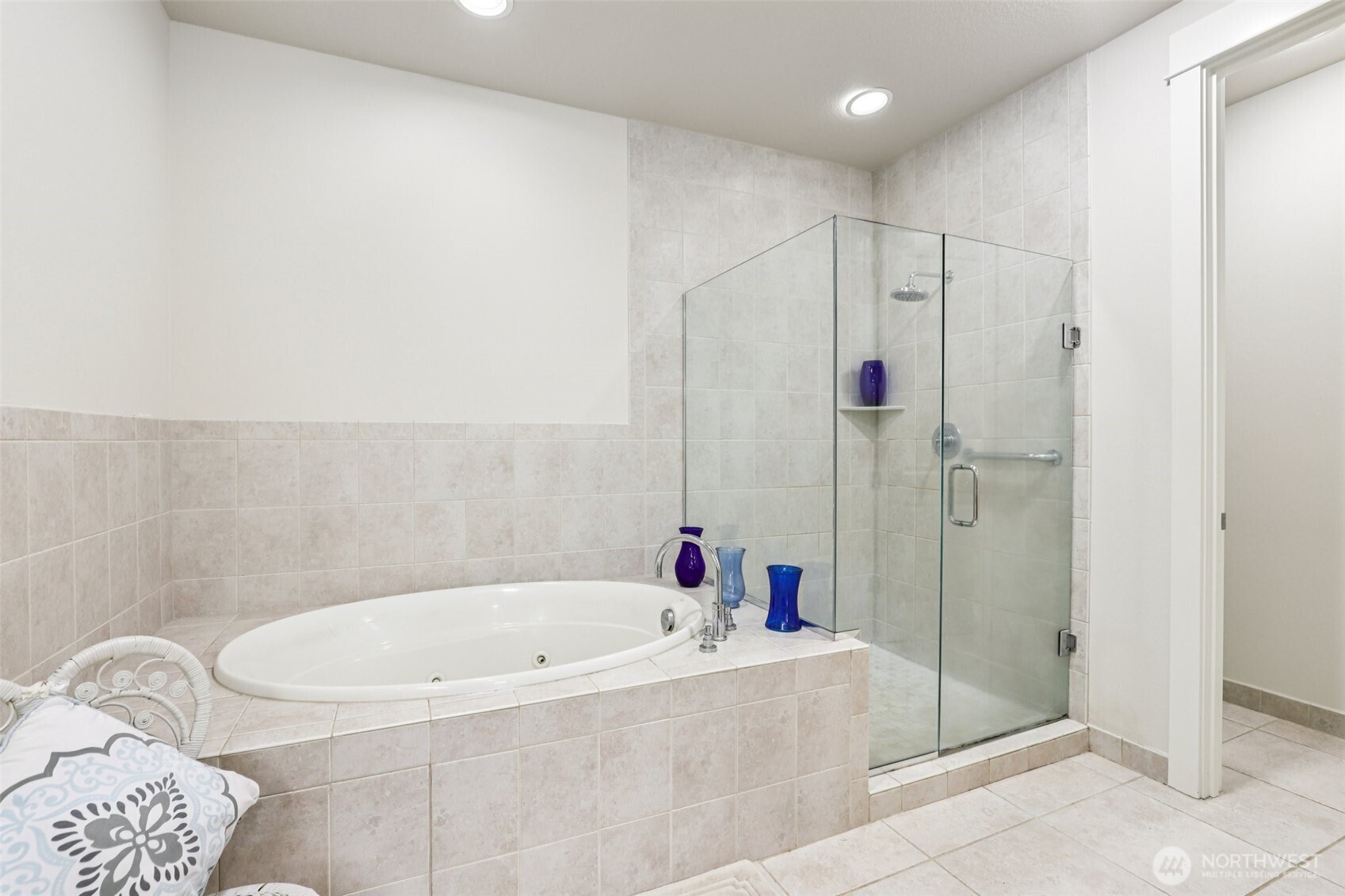 7812 Northwest Quinault Street, Unit 5 Camas, WA 98607 - Photo 24 of 40 a bathroom with a bathtub and a shower