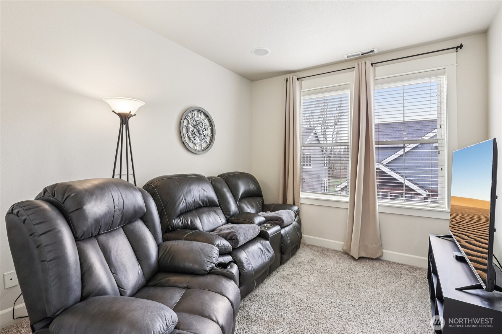 7812 Northwest Quinault Street, Unit 5 Camas, WA 98607 - Photo 26 of 40 a living room with furniture a couch and a window