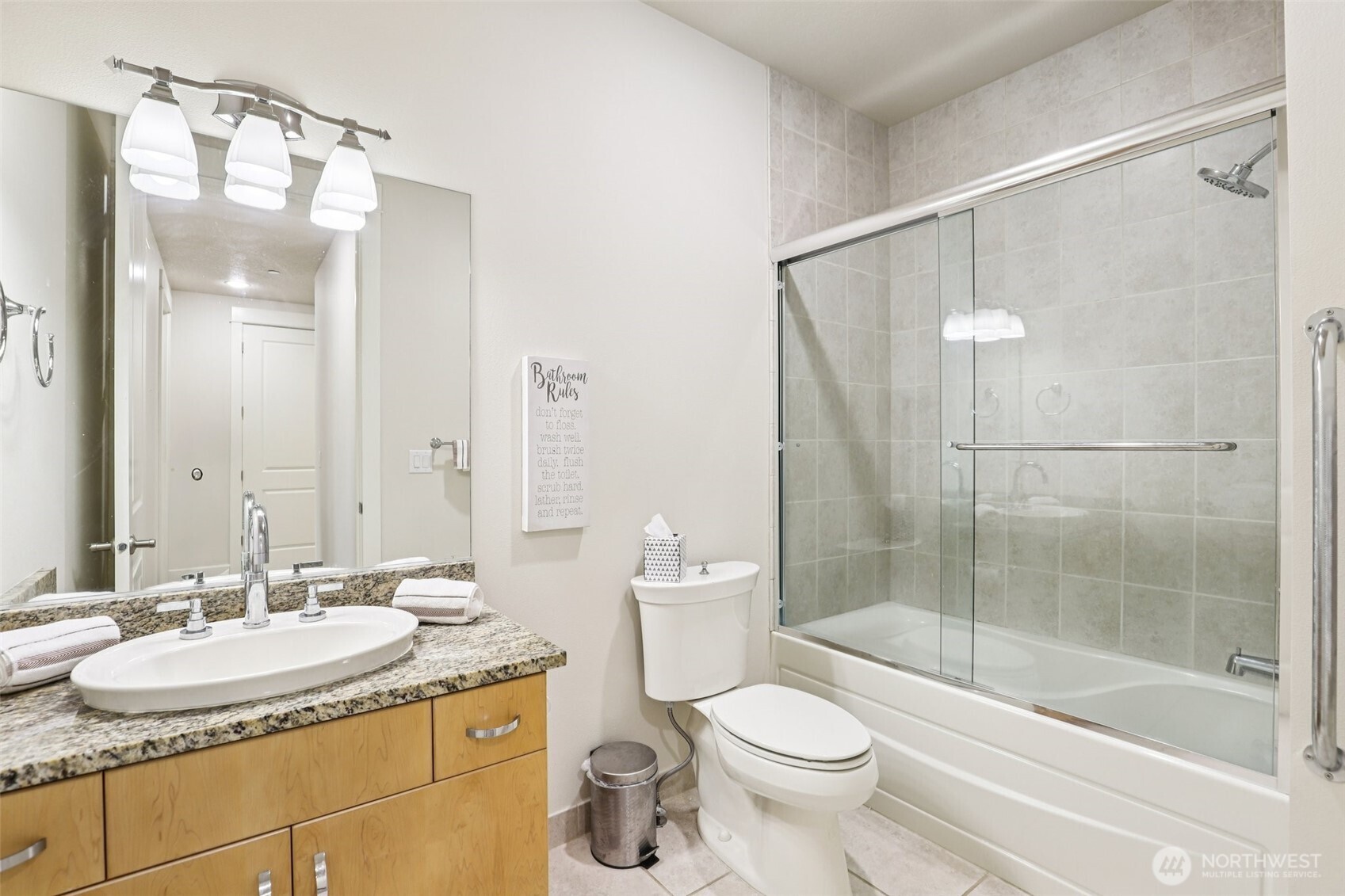 7812 Northwest Quinault Street, Unit 5 Camas, WA 98607 - Photo 28 of 40 a bathroom with a granite countertop sink toilet and shower