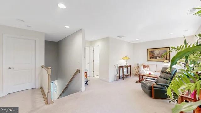 a living room with furniture and a couch