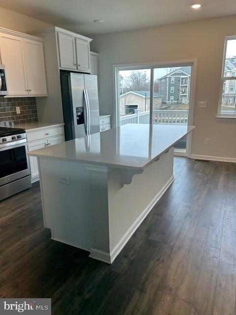 34 Rome Way Mount Laurel, NJ 08054 - Photo 3 of 25 a kitchen with stainless steel appliances a refrigerator a stove a microwave and island