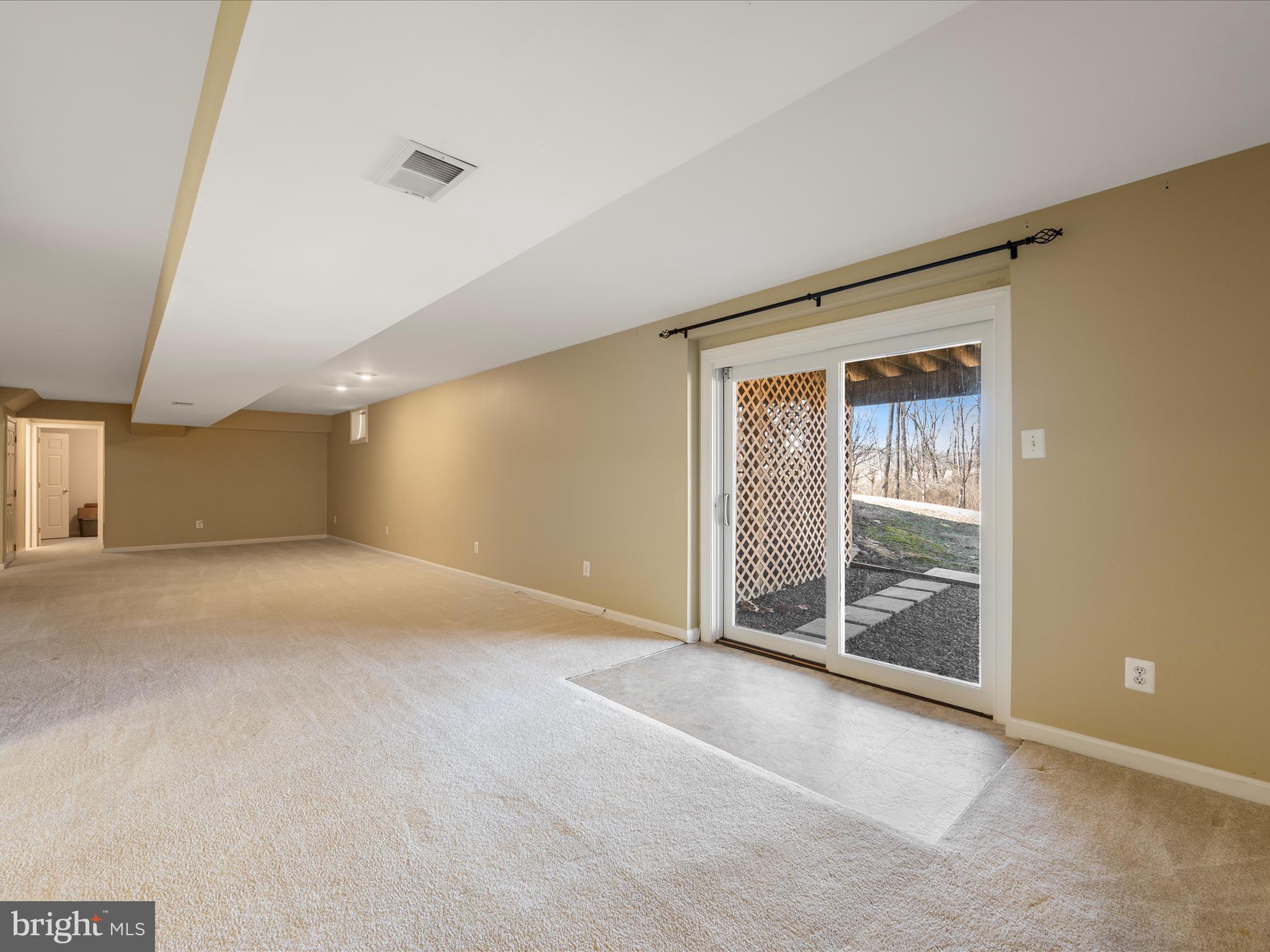 41950 Saddlebrook Place Leesburg, VA 20176 - Photo 51 of 87 a view of an empty room with glass door