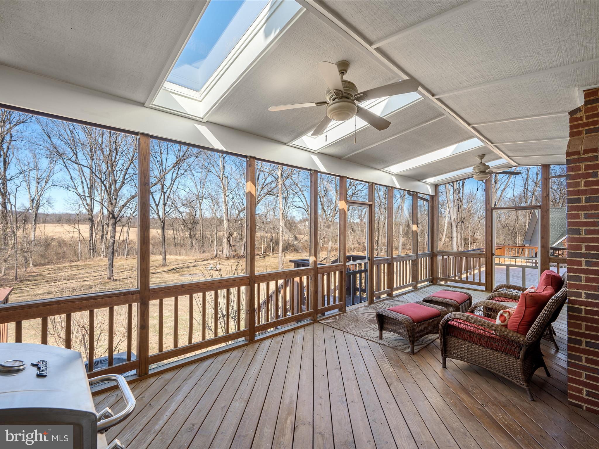 41950 Saddlebrook Place Leesburg, VA 20176 - Photo 54 of 87 a living room with furniture and a wooden floor