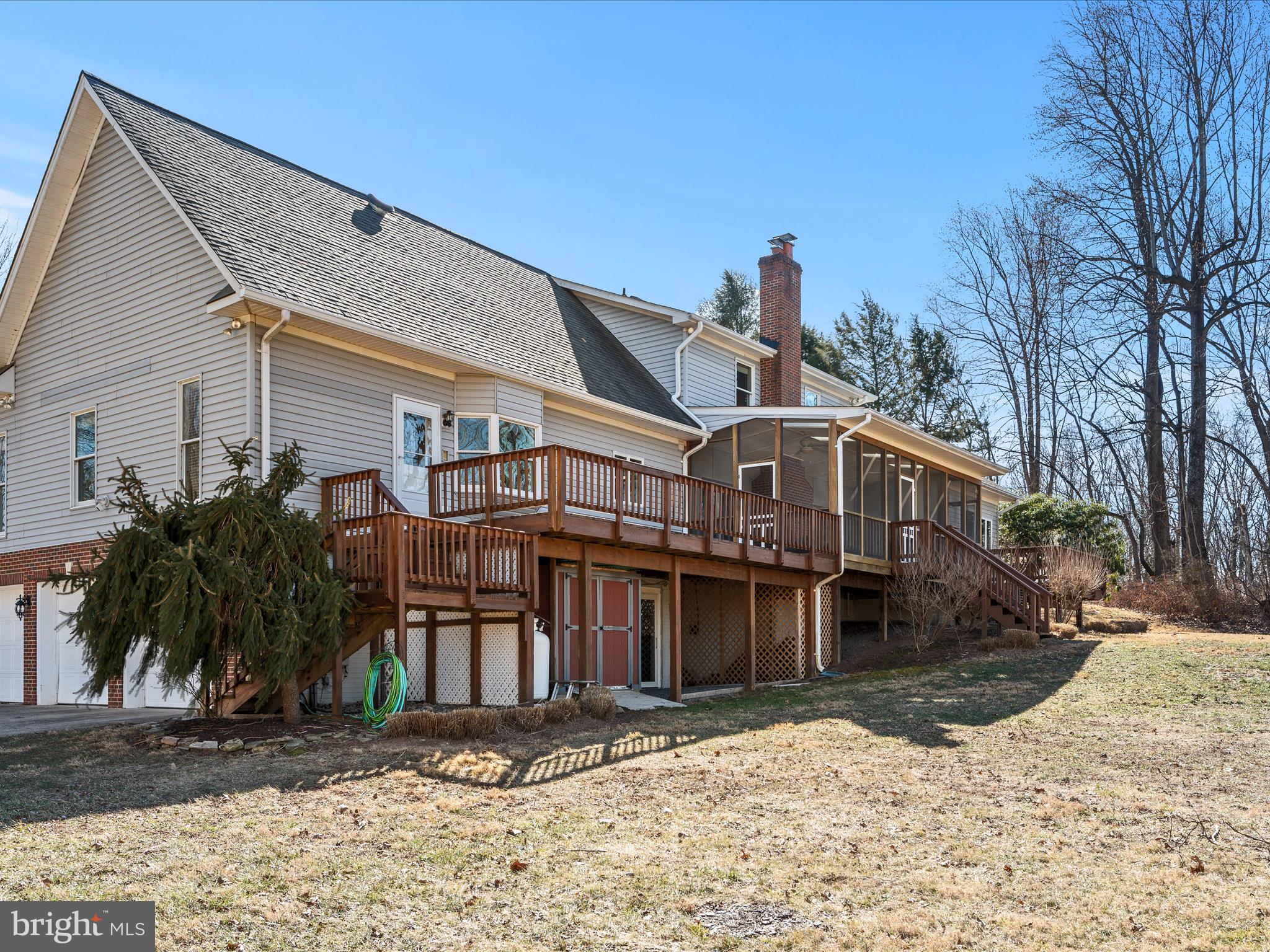 41950 Saddlebrook Place Leesburg, VA 20176 - Photo 62 of 87 a front view of a house with a yard