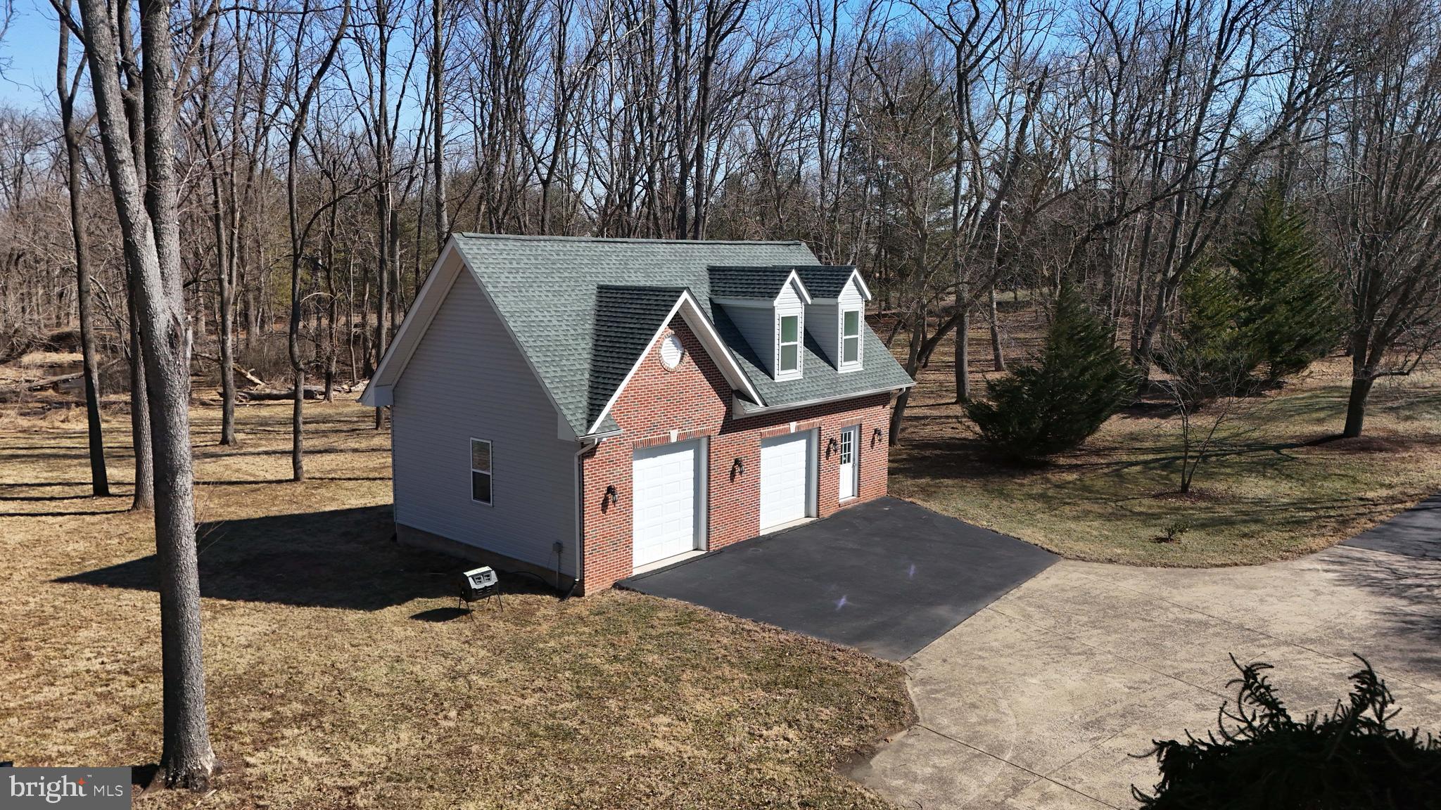 41950 Saddlebrook Place Leesburg, VA 20176 - Photo 69 of 87 a front view of a house with a yard