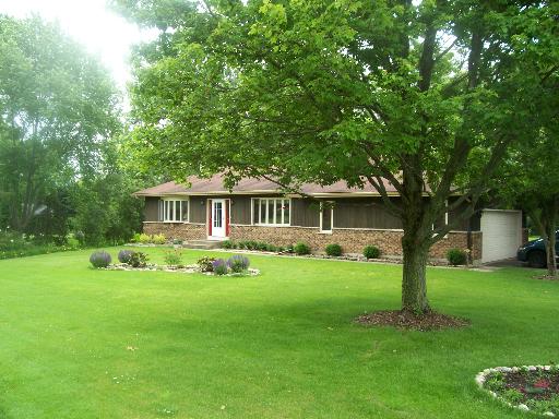 38W131 Pine Road St. Charles, IL 60175 - Photo 1 of 1 a front view of a house with a garden
