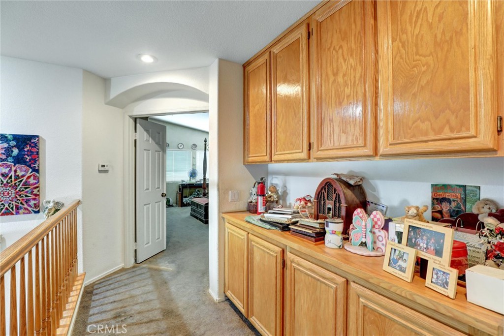 20895 Parish Place Riverside, CA 92508 - Photo 16 of 18 a kitchen with a sink and cabinets