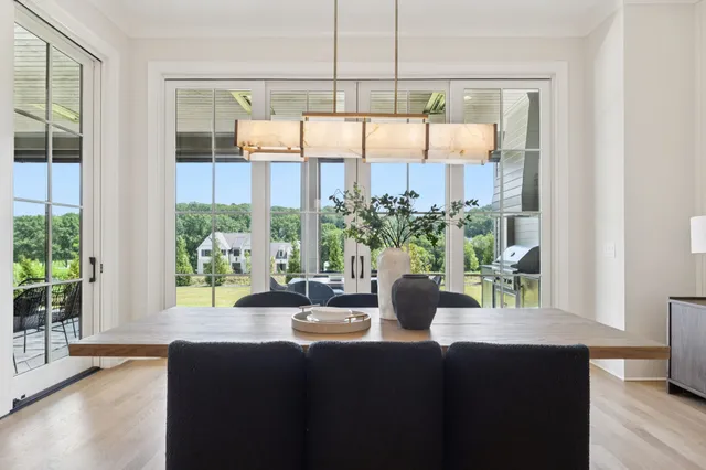 a bedroom with a bed and ceiling fan