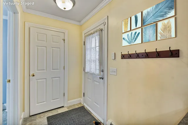 $329,000 | 12 Checkerberry Square, Unit 106, Milton, VT 05468