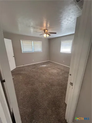 a bathroom with a toilet a sink and bathtub