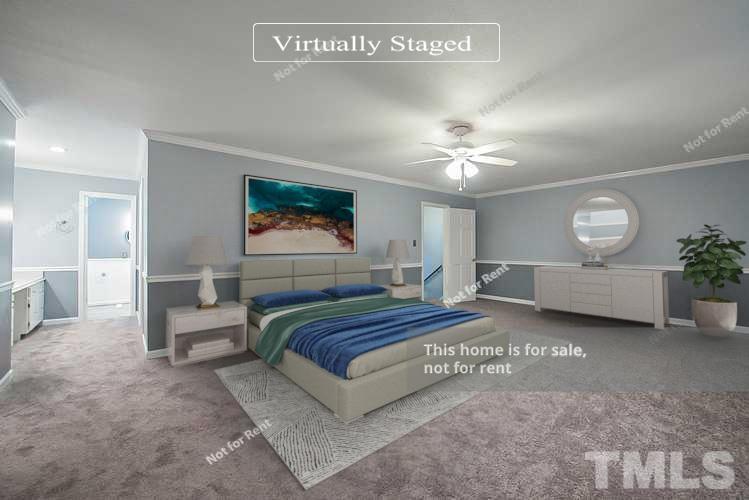 6335 New Market Way, Unit 1 Raleigh, NC 27615 - Photo 3 of 22 a spacious bedroom with a bed and a chandelier