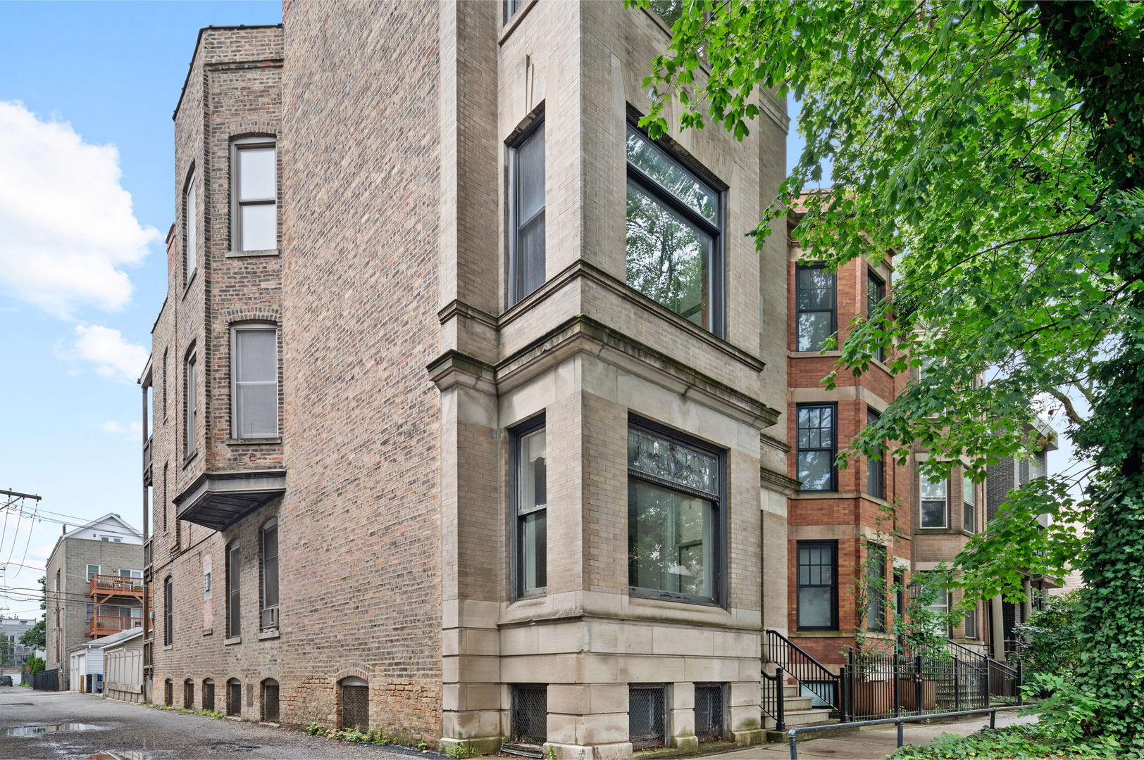 1415 West George Street Chicago, IL 60657 - Photo 2 of 35 a view of a building with a tree