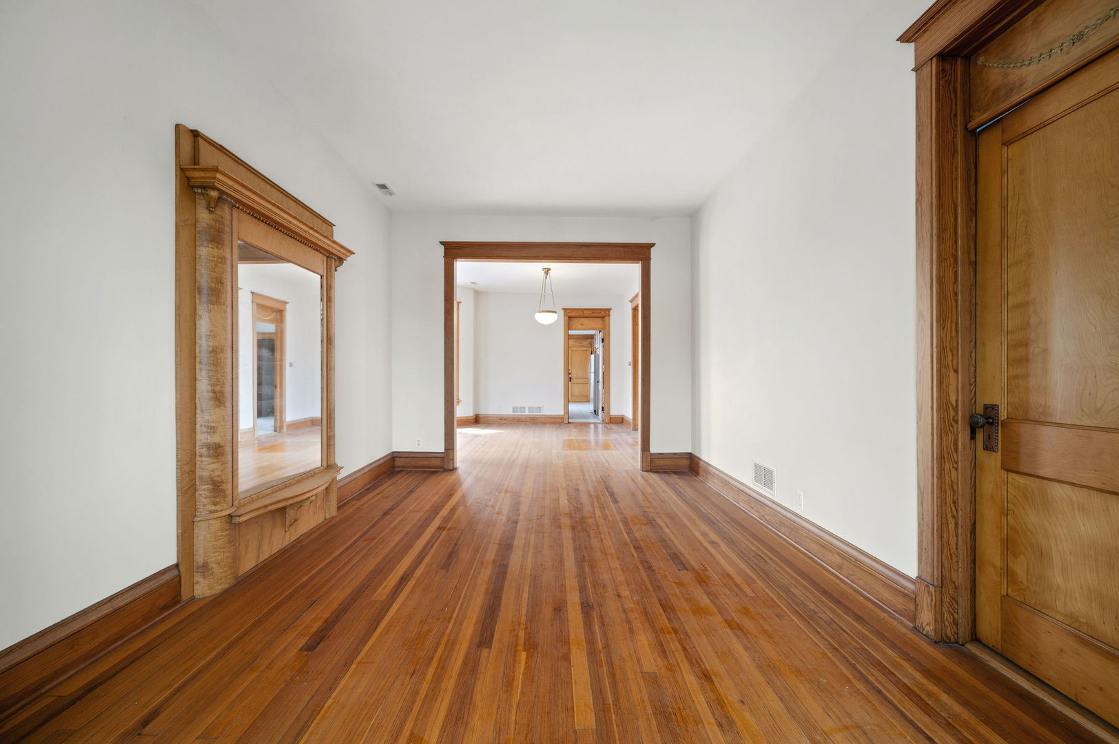 1415 West George Street Chicago, IL 60657 - Photo 23 of 35 a view of a hallway with wooden floor