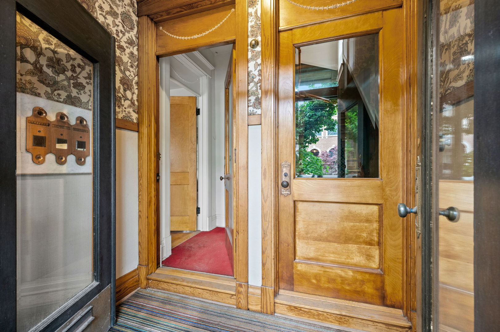 1415 West George Street Chicago, IL 60657 - Photo 3 of 35 a view of a outdoor space with a door and windows