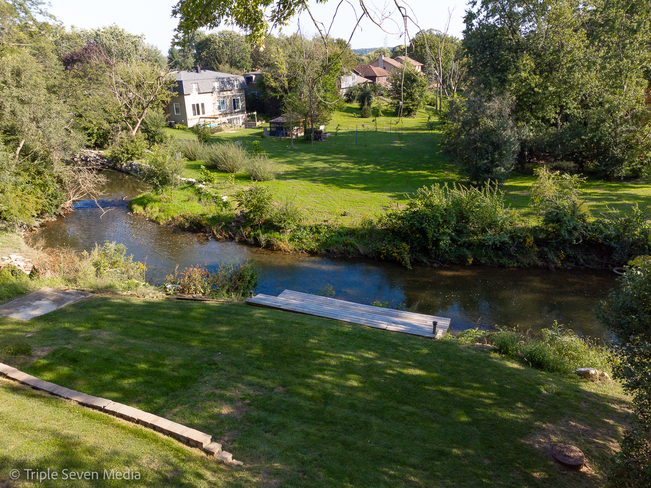11307 German Church Road Willow Springs, IL 60480 - Photo 15 of 49 a view of a lake with a building in the background