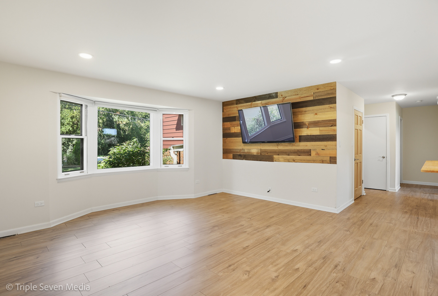 11307 German Church Road Willow Springs, IL 60480 - Photo 24 of 49 a view of an empty room with a window and wooden floor
