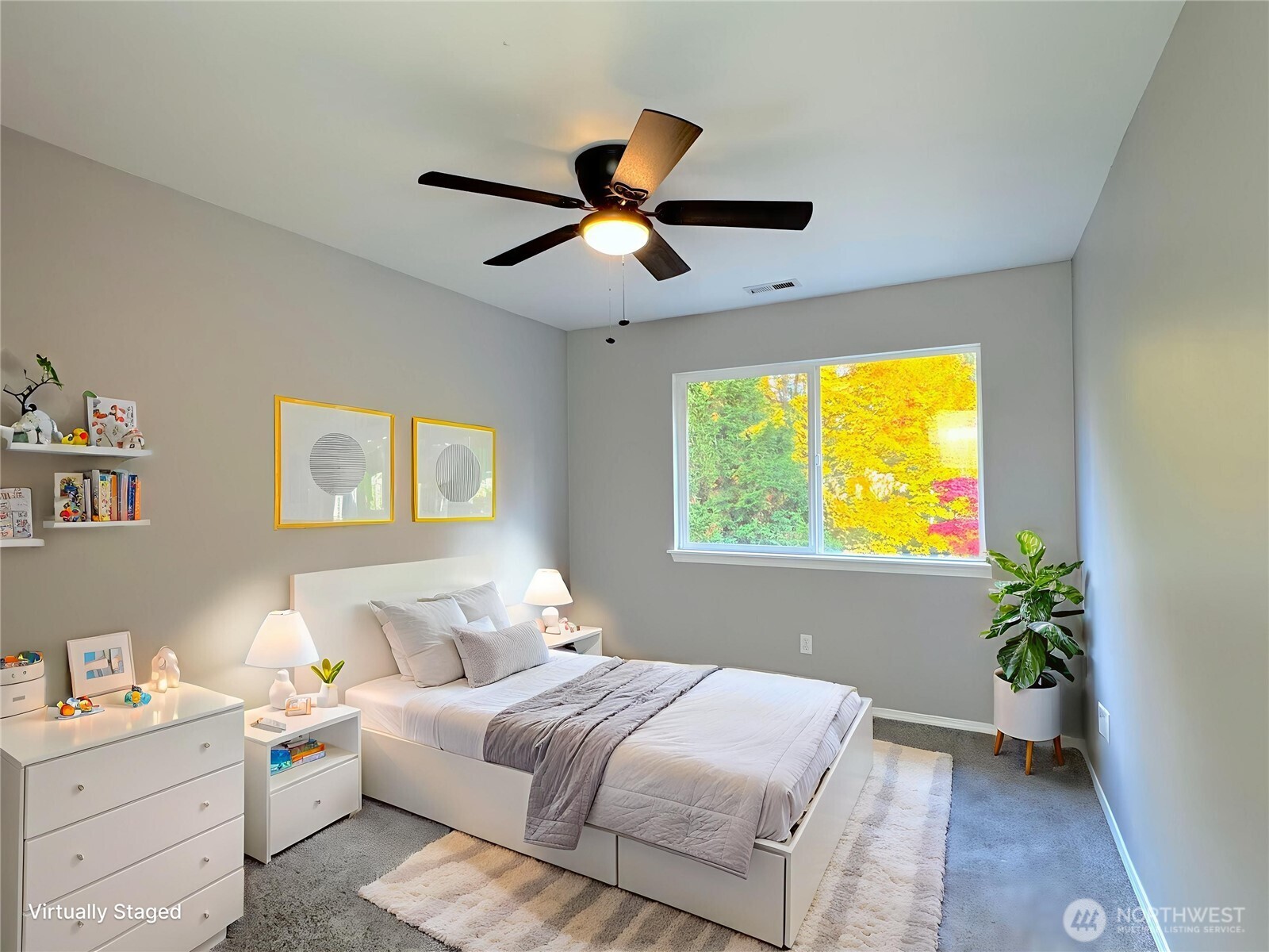 23515 Southeast 243rd Place Maple Valley, WA 98038 - Photo 21 of 28 a bedroom with a bed and a potted plant