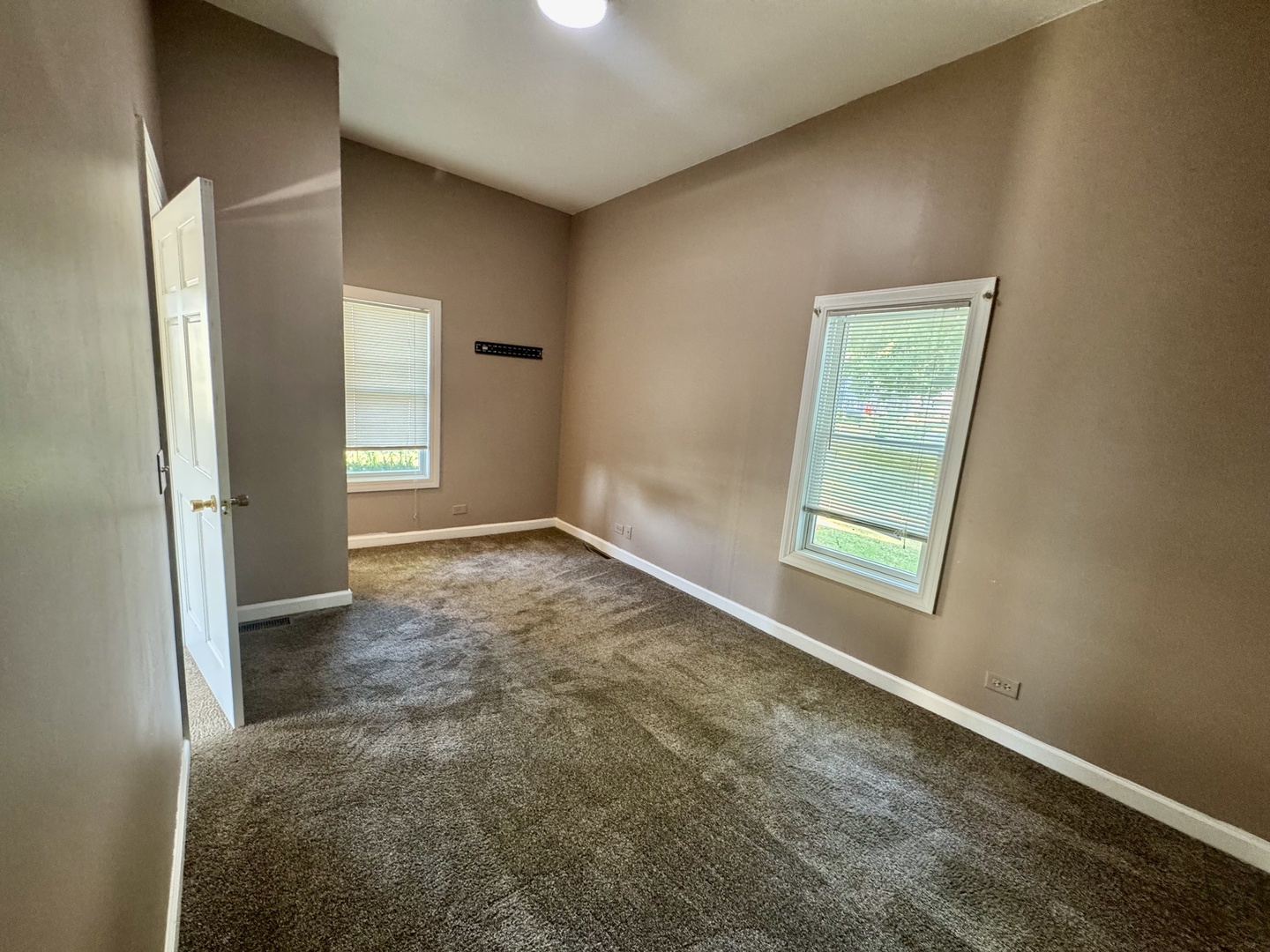 110 North Elm Street Waterman, IL 60556 - Photo 5 of 16 an empty room with windows