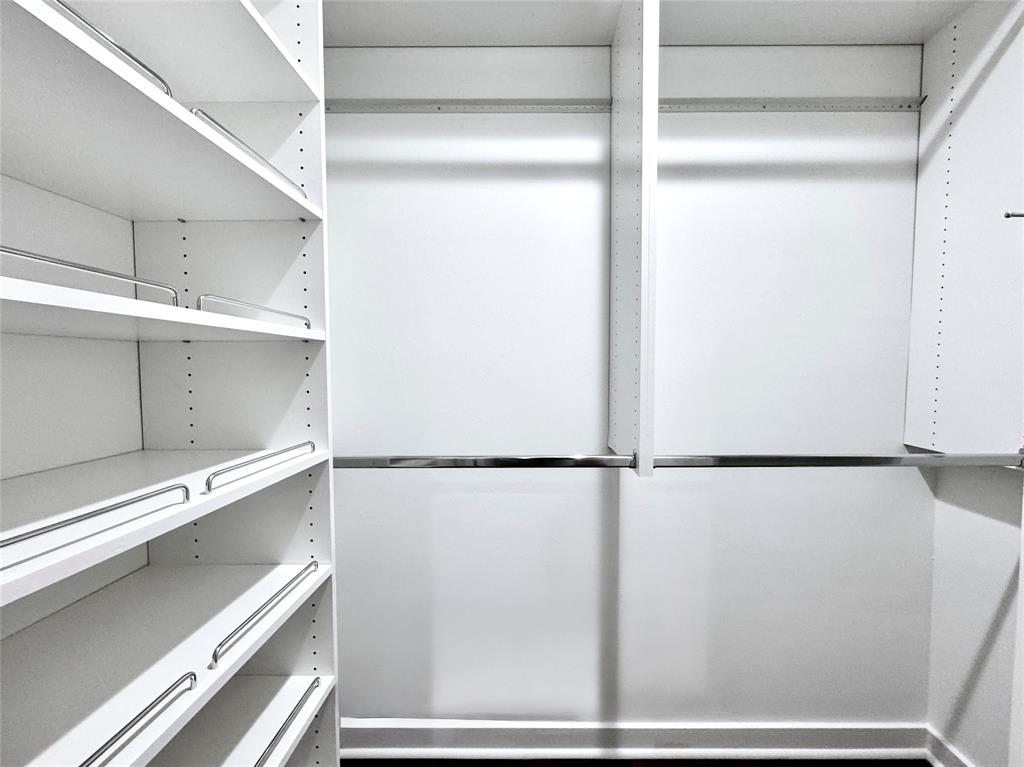 4134 Travis Street, Unit 2 Dallas, TX 75204 - Photo 19 of 28 a view of a walk in closet
