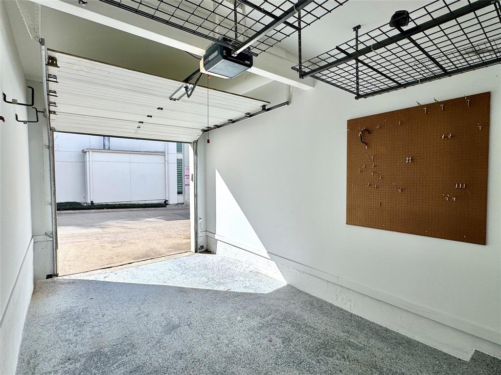4134 Travis Street, Unit 2 Dallas, TX 75204 - Photo 22 of 28 a view of a garage