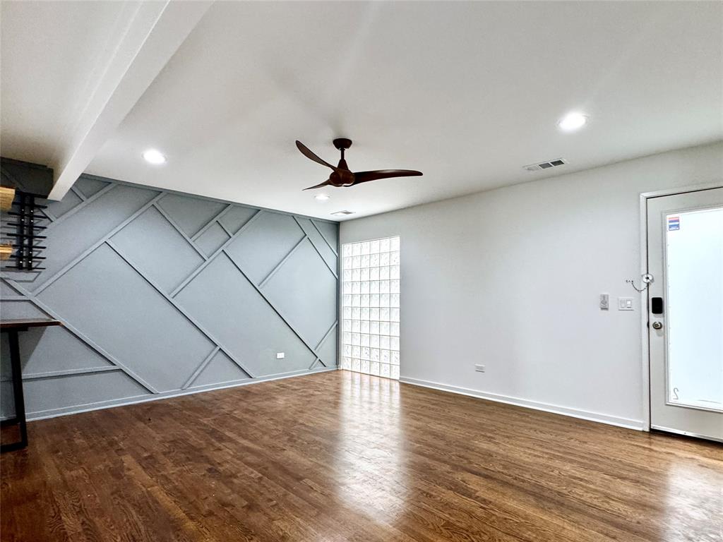 4134 Travis Street, Unit 2 Dallas, TX 75204 - Photo 6 of 28 a view of empty room with wooden floor
