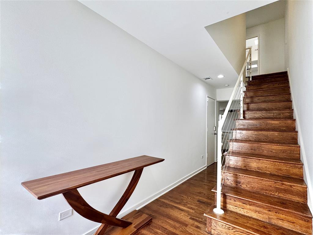 4134 Travis Street, Unit 2 Dallas, TX 75204 - Photo 7 of 28 a view of entryway with wooden floor