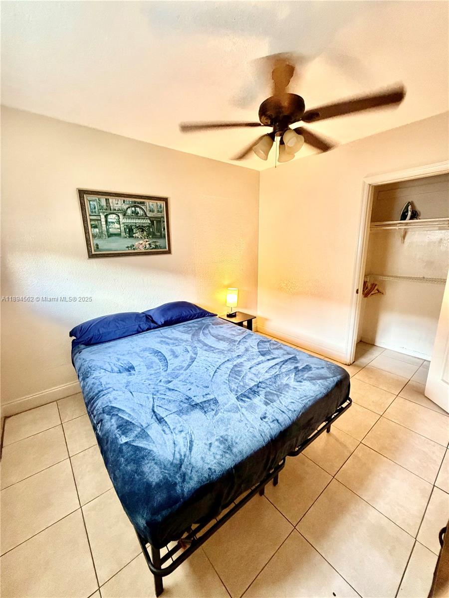 211 Stirling Road, Unit 1 Dania Beach, FL 33004 - Photo 17 of 21 a view of a chandelier
